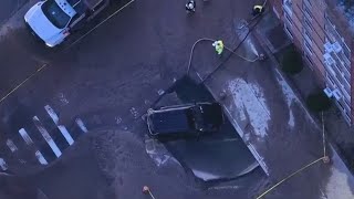 Car stuck in Gravesend after leak causes sinkhole [upl. by Claudie]