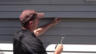 How To Replace One Piece Of Vinyl Siding MidWall [upl. by Katsuyama993]