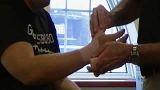 How To Wrap An Elastic Bandage Thumb Sprain [upl. by Costanza]