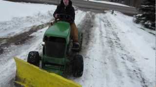 Plowing with john deere 110 [upl. by Narmak808]