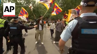 AntiChina protesters clash with police outside Chinese Embassy in Canberra [upl. by Sulrac312]