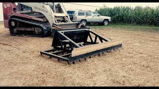 TR600 Rake Skid Steer Attachment by Daniel Manufacturing [upl. by Cosma837]