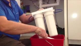 How to change water filter cartridges under sink [upl. by Anaid]