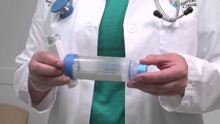 Asthma howto How to use an inhaler with a spacer and mouthpiece [upl. by Aihsiym]