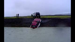 Nissan Patrol y61 bigfoot crossing a glacial river in Iceland [upl. by Zebaj9]