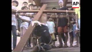 Philippines  Catholics ReEnact Suffering Of Chri [upl. by Luedtke560]