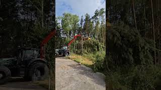 A GMT035 grapple saw on a Valtra T234 tractor with Palfinger Epsilon M70F forestry crane of Bäuml [upl. by Nedap]