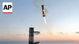 WATCH SpaceX catches Starship rocket booster back at the launch pad [upl. by Carolann25]