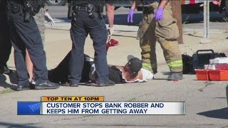 Bank robber shot by customer [upl. by Teece424]