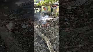 Burning garbage in the neighborhood Silay City Negros Occidental Philippines [upl. by Lukin692]