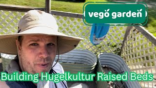 Building Hugelkultur Style raised bed in my vegogarden beds [upl. by Aynotak292]