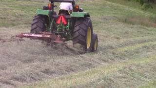 Tedding Hay  New Holland 156 Tedder  06072016 [upl. by Pich]