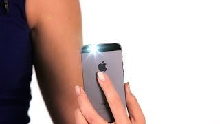 How to Access the Flashlight  iPhone Tips [upl. by Shaefer650]