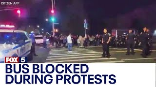 NYC migrant crisis Staten Island demonstrators block bus during protests [upl. by Madlen]