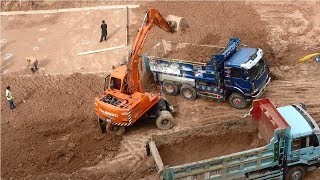 Excavation and leveling process of the foundation  Excavation with excavators and dampers [upl. by Esiralc]