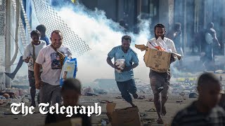 Papua New Guinea Rioting looters kill 16 after police go on strike [upl. by Benge400]