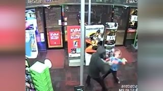 Watch Fearless 7YearOld Boy Punch Armed Robbers During Store Heist [upl. by Aytac988]