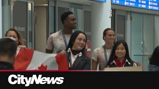 Canadas Olympians get heros welcome at airport [upl. by Hoxsie910]