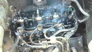 Mini Digger Isuzu engine blowing steam [upl. by Noreen]