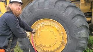 Reinflating a CAT 988 loader tire [upl. by Belia]