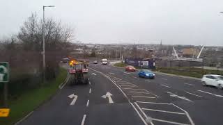 Translink bus overtaking a tractor from the Traffic Lights [upl. by Atinihc]