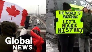 Trucker convoy People line bridges in Greater Toronto Area as trucks roll through [upl. by Idisahc774]