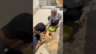 They are making clay oven due to shortage of gas fuel in Gaza clay oven diy homemade shorts [upl. by Alper815]