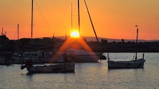 Spain  Balearic Island Mallorca  Can Pastillia  small harbor amp sunset behind boats [upl. by Tab636]