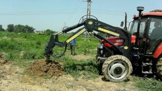 TRACTOR FRONT MOUNTED EARTH AUGER DIGGING AUGER [upl. by Pfister131]