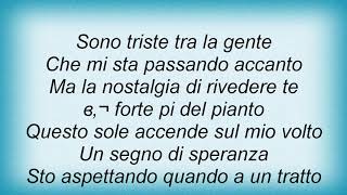 Andrea Bocelli  Lappuntamento Lyrics [upl. by Cower502]