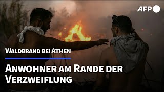 quotDas Feuer kommt von überallquot Anwohner entsetzt über Waldbrand bei Athen  AFP [upl. by Mott]