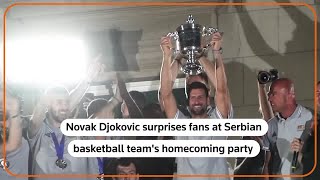 Novak Djokovic celebrates with Serbian basketball team [upl. by Lairbag]