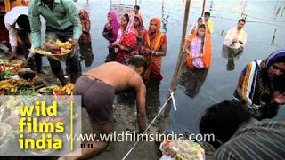 Women offer pray to Sun God during Chhath puja [upl. by Diarmuid]