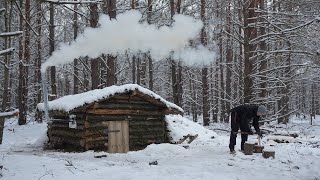 Winter shelter building in the woods Solo bushcraft Off grid log cabin [upl. by Petra]