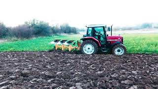 Massey Ferguson 6140 ploughing with Huard plough Massey Ferguson 6140 oranje sa Huard plugom [upl. by Aital567]