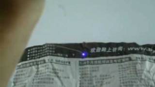 The power of 50mw blue laser pointer that can burn paper [upl. by Lucy]