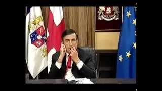 Georgian President Mikheil Saakashvili eats his tie [upl. by Aekan]