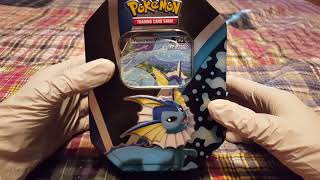 Pokémon Trading Card Game – Opening an Eevee Evolutions Tin Vaporeon V [upl. by Anirda]