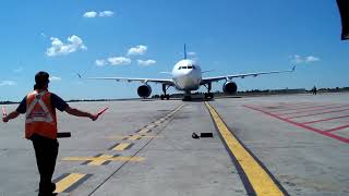 Marshaling a Thomas Cook Airbus A330 into gate 15 at YOW [upl. by Niabi]