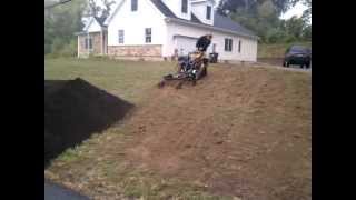 Vermeer S800TX Mini Skid Steer with Harley Rake Attachment [upl. by Notle]