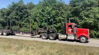 Kenworth W900 day cab hauling an empty log trailer Peterbilt 389 day cab hauling an empty log T [upl. by Henryk]