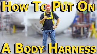 How to put on a Body Harness [upl. by Rozella]