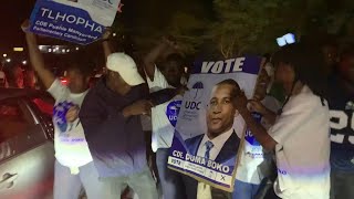 People in Botswana capital celebrate after opposition party win  AFP [upl. by Nnaaras]