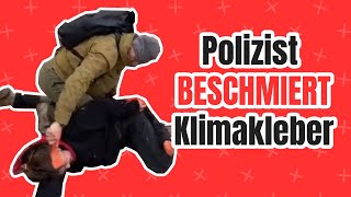 Berliner Polizist beschmiert Klimakleber [upl. by Tavy944]