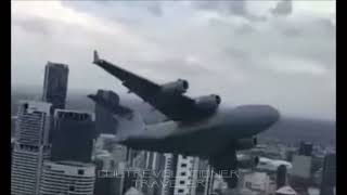 C17 Globemaster shocking pass between buildings in Brisbane [upl. by Enytnoel308]