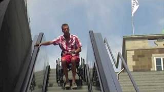 Rollstuhl auf der Rolltreppe wheelchair escalator [upl. by Atirec]