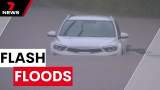 Heavy rain causes flash floods across Brisbane and the Redlands  7NEWS [upl. by Savell]