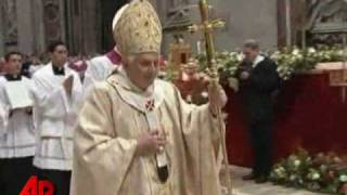 Raw Video Pope Knocked Down at Christmas Mass [upl. by Shuler]