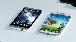 Smartphone faceoff HTC One v Samsung Galaxy S4 technology review [upl. by Ahsinak769]