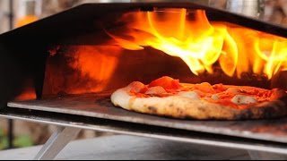 First Ooni Worlds First Portable Wood Fired Pizza Oven [upl. by Rorie]